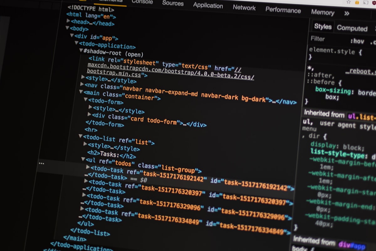Developer workstation with code on screen